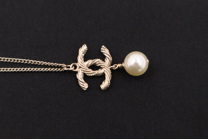 Chanel CC and Pearl Necklace