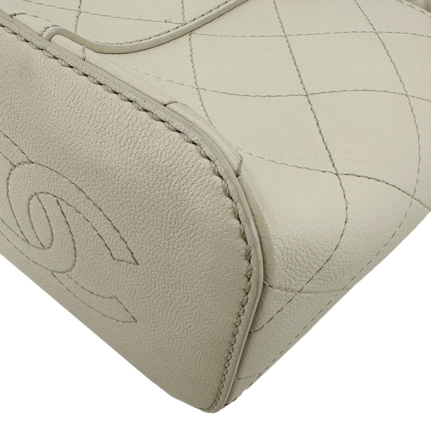 CHANEL CC Drawstring Quilted Leather Crossbody Bucket Bag Cream