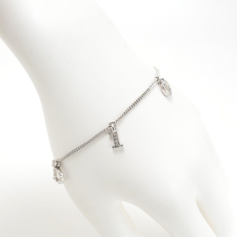 Christian Dior bracelet Gold Plated, Crystal Stone Silver Logo charm Women