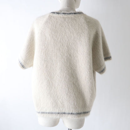 Christian Dior knit Main: 34% mohair, Main: 31% virgin wool, Main: 18% nylon, Main: 13% cashmere, Main: 3% wool Ivoryx black Women 44