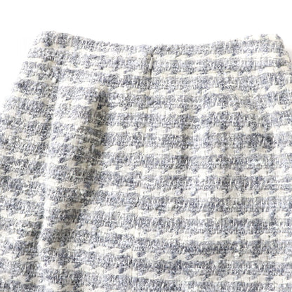 CHANEL skirt Main: 50% wool, Main: 25% nylon, Main: 15% rayon, Main: 10% cashmere, Lining: 100% silk Light gray x white x glitter (tweed) Women 34